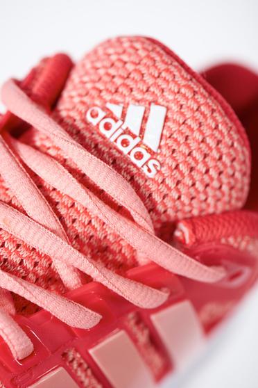 Pantofi sport Adidas portocalii casual cu talpa joasa cu dungi verticale