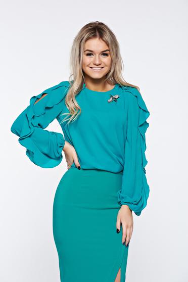 Bluza dama LaDonna turcoaz eleganta din material vaporos accesorizata cu brosa