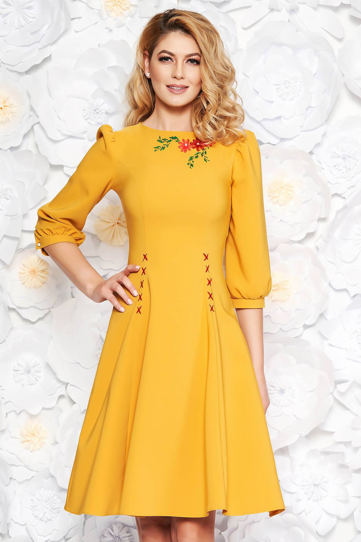 Rochie LaDonna mustarie eleganta brodata in clos din stofa usor elastica cu maneci trei-sferturi